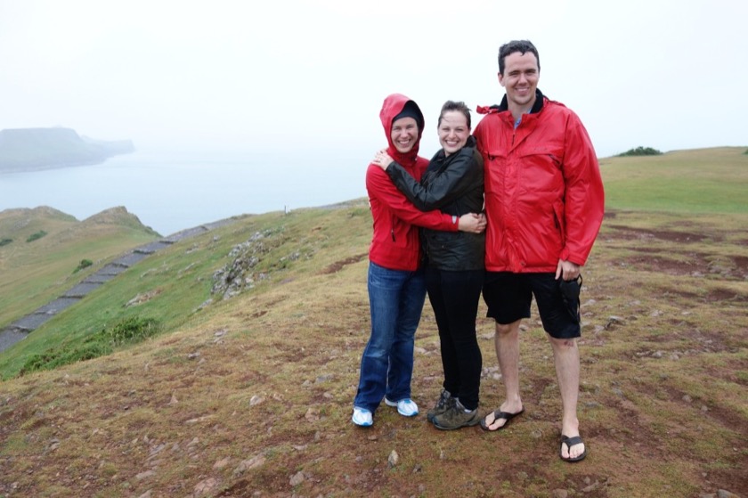 Rachael, Sarah, and Dan soaking up the rain in Wales.