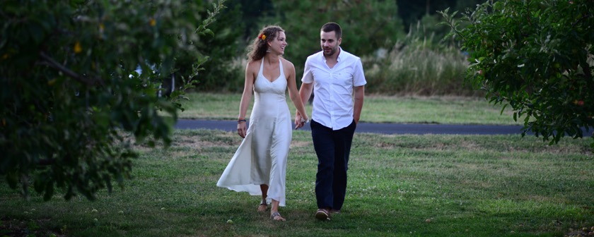 Rachael and me walking in Mike and Leanne's orchard  on our wedding day in 2013.