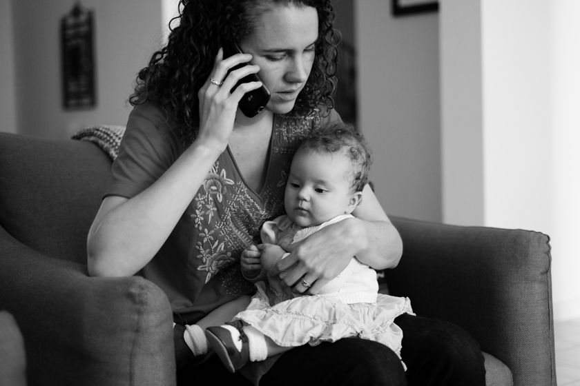 Idara sitting in on an important phone call.