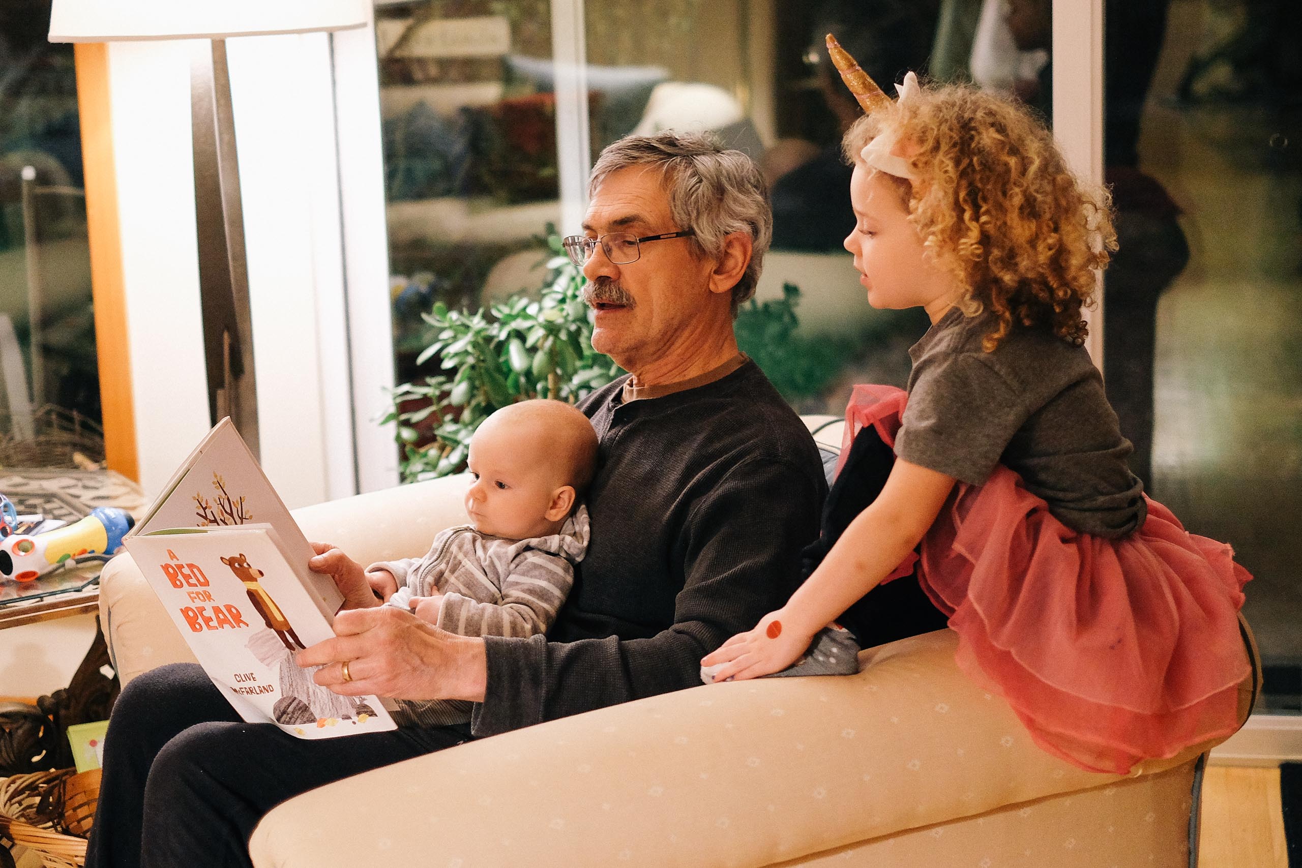 oren reading with gordy and idara